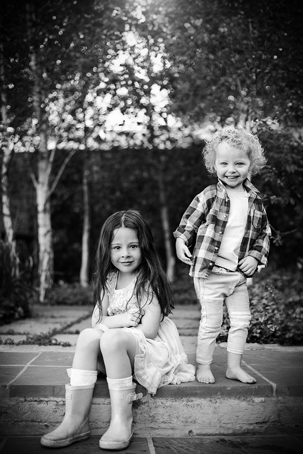 brother and sister on steps